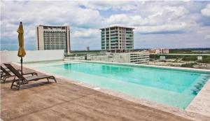 Apartment with a view of the lagoon and pool