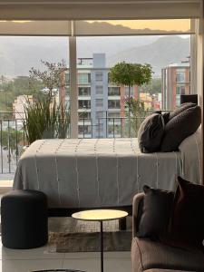 Chic 1BR 1BA Zoho Skies condo with rooftop pool stunning views