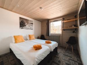 Hotels Lodge Les Merisiers : photos des chambres