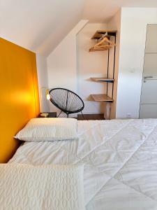 Maisons de vacances Ti Loc - Maison familiale - Proche de l-ocean et du Golfe du Morbihan : photos des chambres