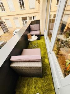 Appartements L-Ecrin de Pierre T1 bis balcon : photos des chambres