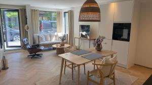 Beachfront apartment with private swimming dock