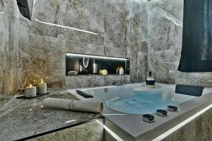 Appartements Welcome to L-ASTRAL ACUZZI : photos des chambres