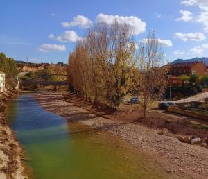 Piso a orillas del río