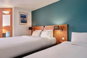 Hotels Kyriad Paris Sud Les Ulis Courtaboeuf : photos des chambres