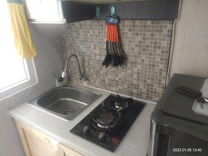 Green Pramuka City - Studio Room