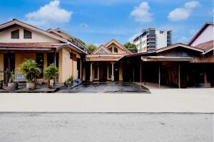Hotel O Balikpapan near Taman Beruang Madu formerly Palm Cafe Inn - 2hvězdičkové hotely ve městě Balikpapan