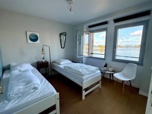 Maisons de vacances Avel Mor et sa VUE imprenable sur l-ile de St Cado : photos des chambres