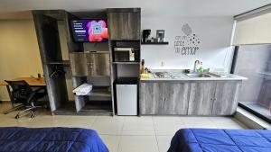 S07 DOBLE Premium Suite TEC CEM con Cocineta WiFi Balcón Parking Terraza