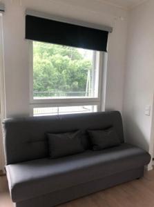 Huoneisto terassilla & parkkipaikalla