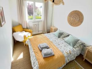 Appartements La Butte Enchantee Apartment : photos des chambres