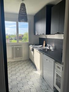 Appartements La Butte Enchantee Apartment : photos des chambres