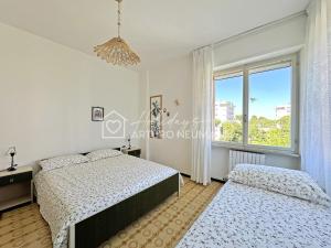 165 - RESIDENCE CONERO a Marcelli- Trilocale al 3 piano con ASCENSORE, 2 PISCINE, PARCO GIOCHI e 2 CAMPI DA TENNIS - CLIMATIZZATO, SPIAGGIA AL WHITE BEACH CLUB INCLUSA