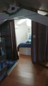 Maisons de vacances Nid sous le volcan - Maison avec jardins : photos des chambres