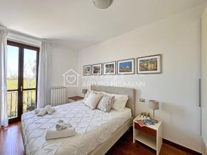 229 - Appartamento trilocale al primo piano con ampio terrazzo - al residence Adamo ed Eva con piscina e campo da calcetto, climatizzato - SPIAGGIA INCLUSA AL WHITE BEACH CLUB