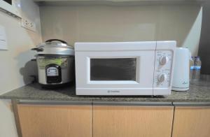 Explore Mitsukoshi Uptown BGC, large TV, fast WIFI