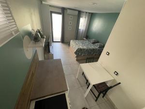 Appartements Equipped Studio, 2 hours per day acces to a private swinmming pool : photos des chambres