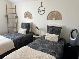Maisons de vacances Villa Emma , maison classee 3 etoiles au centre de tout avec jardin clos a Chatellerault, a 20 mn Futuroscope&Aquascope : photos des chambres
