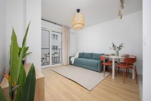 Modern and Comfortable Studios with Smart TVs near PGE by Noclegi Renters