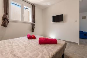 Appartements Le Bartulettu 1 - Proche Aeroport D-Ajaccio : photos des chambres