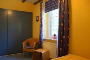 4 Personen Fachwerkhaus in erster Reihe zum Deich mit Badewanne und Kamin