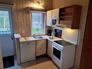 6 Personen Ferienhaus mit Sauna, Whirlpool, Kaminofen und Kanu in 2. Rheie zum See in Otterndorf