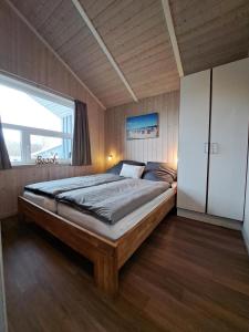 6 Personen Ferienhaus mit Sauna, Whirlpool, Kaminofen und Kanu in 2. Rheie zum See in Otterndorf