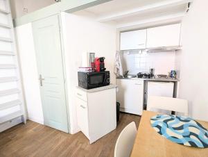 Appartements La Cabane avec Clim, centre, Tout a pied, 4 pers! : photos des chambres