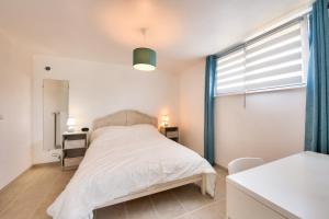 Appartements 100m de la plage - Appart avec jardin pour 5 : photos des chambres