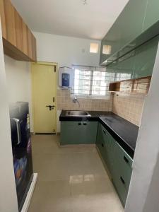 GreenFall 2 - Breezy Big 1BHK flat attach bath