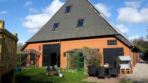 Gästehaus Nielson, Terrassenwohnung Sommerwind mit Garten