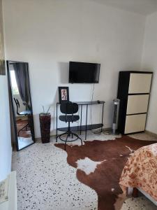 Appartements Charme et piscine dans le Gard salon et deux chambres : photos des chambres