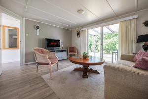 26, gelegen in het bosrijke Oisterwijk met privé tuin!