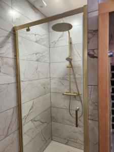 Appartements La Volupte - Love room avec Jacuzzi - Sauna : photos des chambres