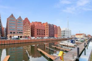 Granaria Premium River View by Downtown Apartments