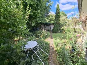 Appartements Atypical apartment - panoramic view of wooded garden : photos des chambres