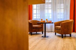 Appartements Le 16-Appart-Hotel-GregIMMO : photos des chambres