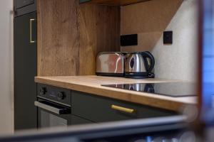 Appartements Le 16-Appart-Hotel-GregIMMO : photos des chambres