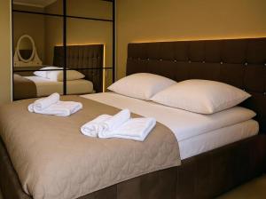 Nadmorskie Tarasy Apartament Park i Morze z garażem, basen, sauna, jacuzzi