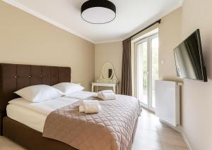 Nadmorskie Tarasy Apartament Park i Morze z garażem, basen, sauna, jacuzzi