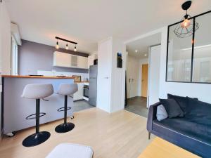 Appartements Saint Ruth - Apartment for 2 with private parking : photos des chambres
