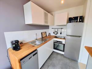 Appartements Saint Ruth - Apartment for 2 with private parking : photos des chambres