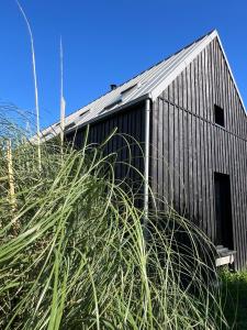 Maisons de vacances Wooden architect-designed house : photos des chambres