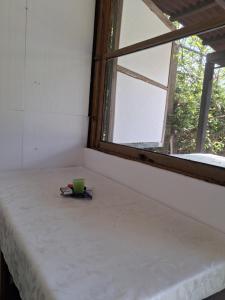 LAND FOR YOUR TENT NEXT TO A RIVER WITH A GARDEN SHACK ROOM you get two bicycles for amazing views and two water floats for a nice river run USE THE LOCATION NOT THE ADDRESS TO GET HERE bathroom is a bit different so check YouTube video RiverRunDusko