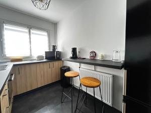 Appartements Le Benedictins, proche de la Gare : photos des chambres