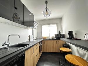 Appartements Le Benedictins, proche de la Gare : photos des chambres