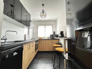 Appartements Le Benedictins, proche de la Gare : photos des chambres