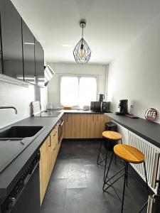 Appartements Le Benedictins, proche de la Gare : photos des chambres
