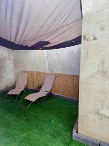 Appartements Appartement avec Jaccuzi & Jardin : photos des chambres
