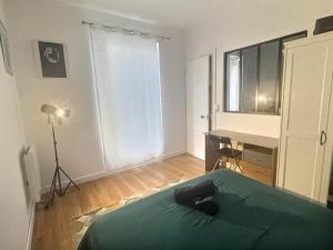 Appartements La Cozy & Chill a Malakoff 4 personnes proche metro et toutes commodites : photos des chambres